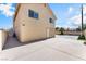 Exterior shot of home with a large backyard patio and a second story at 5516 Cory Pl, Las Vegas, NV 89107