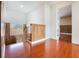 Hallway with hardwood flooring and a half wall at 5516 Cory Pl, Las Vegas, NV 89107