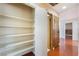 Hallway with closet and hardwood flooring throughout at 5516 Cory Pl, Las Vegas, NV 89107