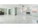 Bright and spacious living room features marble floors and modern fireplace at 5516 Cory Pl, Las Vegas, NV 89107