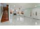 Bright living room features marble floors and a modern electric fireplace at 5516 Cory Pl, Las Vegas, NV 89107
