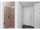 Tiled shower featuring modern fixtures in this bathroom with neutral colors and updated cabinets at 5523 Orchard Ln # 0, Las Vegas, NV 89110