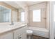 Bright bathroom with tub, shower, and vanity, designed for functional style at 5523 Orchard Ln # 0, Las Vegas, NV 89110