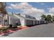 Inviting townhome exterior with neutral tones, attached garage, and neat landscaping creates curb appeal at 5523 Orchard Ln # 0, Las Vegas, NV 89110