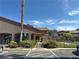 Exterior showcases community building with ample parking, landscaping, and easy access to amenities at 5750 E Hacienda Ave # 107, Las Vegas, NV 89122