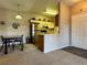 Compact kitchen featuring modern appliances and an eat-in bar at 5750 E Hacienda Ave # 107, Las Vegas, NV 89122
