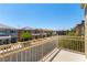 A view from the balcony looking across the street at other homes in the neighborhood at 6308 Anticline Ave, Las Vegas, NV 89139