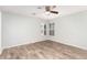 Large bedroom featuring hardwood floors, recessed lighting, and two windows at 6308 Anticline Ave, Las Vegas, NV 89139