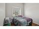 Cozy bedroom featuring a twin bed with a window at 6812 Coral Rock Dr, Las Vegas, NV 89108