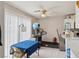Bright dining area with a ceiling fan, leading to a sliding glass door at 6812 Coral Rock Dr, Las Vegas, NV 89108