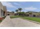 Expansive backyard with a well-manicured lawn, water features, and beautiful landscaping at 6845 Hidden Sunset Ln, Las Vegas, NV 89120
