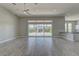 The living room features recessed lighting, light floors, neutral walls, and a sliding glass door at 6845 Hidden Sunset Ln, Las Vegas, NV 89120
