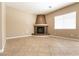 Inviting living room with tile flooring, a unique fireplace, and bright natural light at 6929 Homing Pigeon Pl, North Las Vegas, NV 89084