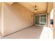 Covered patio with ceiling fan, offering a comfortable outdoor living space at 6929 Homing Pigeon Pl, North Las Vegas, NV 89084
