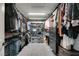 Spacious walk-in closet with custom shelving and storage for optimal organization at 7077 Sunland Hills Ave, Las Vegas, NV 89113