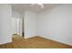 Bright bedroom with wood-look laminate flooring offering a warm and inviting space to personalize at 7143 S Durango Dr # 202, Las Vegas, NV 89113