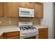 Updated kitchen featuring modern LG appliances and a stylish backsplash for a contemporary culinary experience at 7143 S Durango Dr # 202, Las Vegas, NV 89113