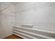A walk-in closet features wire shelving for optimal organization and ample storage for clothing and accessories at 7143 S Durango Dr # 202, Las Vegas, NV 89113