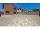 Spacious backyard with a privacy wall, perfect for creating an outdoor living space at 7464 Edgecove Ct, Las Vegas, NV 89139