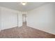 This bedroom offers carpeting and a double door closet at 7464 Edgecove Ct, Las Vegas, NV 89139
