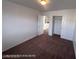 Bedroom with fresh paint, plush carpet and closet at 7464 Edgecove Ct, Las Vegas, NV 89139