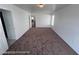 Bedroom with neutral carpet, fresh paint and natural lighting at 7464 Edgecove Ct, Las Vegas, NV 89139