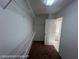 Walk-in closet featuring shelving and carpet at 7464 Edgecove Ct, Las Vegas, NV 89139