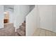 Inviting tiled foyer with nearby carpeted staircase and entry to nearby bathroom at 7464 Edgecove Ct, Las Vegas, NV 89139