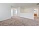 Hallway featuring plush carpeting that leads to the bathroom at 7464 Edgecove Ct, Las Vegas, NV 89139