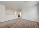 Hallway features plush carpeting that leads to another room at 7464 Edgecove Ct, Las Vegas, NV 89139