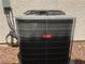 Bryant air conditioning unit on a gravel ground, ensuring optimal climate control and energy efficiency at 7620 Donald Nelson Ave, Las Vegas, NV 89131