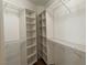 Walk-in closet with built-in shelves for optimal organization at 7620 Donald Nelson Ave, Las Vegas, NV 89131