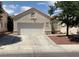 Charming single-story home with well-maintained stucco, red tile roof and a spacious two car garage at 7620 Donald Nelson Ave, Las Vegas, NV 89131