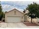 Charming single-story home with well-maintained stucco, red tile roof and a spacious two car garage at 7620 Donald Nelson Ave, Las Vegas, NV 89131