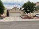 Charming single-story home with a two car garage and low maintenance landscaping at 7620 Donald Nelson Ave, Las Vegas, NV 89131