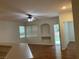 Cozy living room with a ceiling fan and access to the backyard at 7620 Donald Nelson Ave, Las Vegas, NV 89131