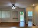Bright living room showcasing hardwood floors, neutral paint, a ceiling fan and recessed lighting at 7620 Donald Nelson Ave, Las Vegas, NV 89131
