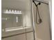 Bathroom shower features glass doors and tiled walls at 7620 Donald Nelson Ave, Las Vegas, NV 89131