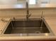 Close-up on a stainless steel sink with a modern faucet at 7620 Donald Nelson Ave, Las Vegas, NV 89131