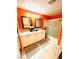 Bathroom features a white double vanity with a shower tub combo at 8156 Blue Hope Diamond Ln, Las Vegas, NV 89139