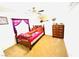 Cozy bedroom with carpet, ceiling fan, window with curtains, and traditional wood furniture at 8156 Blue Hope Diamond Ln, Las Vegas, NV 89139