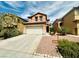 Charming two-story home with a well-maintained front yard and an attached two-car garage at 8156 Blue Hope Diamond Ln, Las Vegas, NV 89139