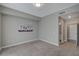This bedroom has gray carpet and a painting on the wall. There is also a closet and a door to the bathroom at 8255 S Las Vegas Blvd # 2004, Las Vegas, NV 89123
