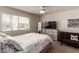 Bright bedroom with large window and neutral decor, creating a serene and inviting space at 8600 W Charleston Blvd # 2187, Las Vegas, NV 89117