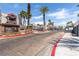 Gated community entrance featuring lush landscaping and a secure access point at 8600 W Charleston Blvd # 2187, Las Vegas, NV 89117