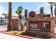 Welcoming entrance with stone signage for Park 1 at Summerlingate with well-maintained landscaping at 8600 W Charleston Blvd # 2187, Las Vegas, NV 89117