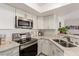 Contemporary kitchen featuring stainless steel appliances, ample counter space, and stylish fixtures at 8600 W Charleston Blvd # 2187, Las Vegas, NV 89117