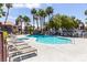 Inviting swimming pool with a waterfall feature and plenty of space for sunbathing at 8600 W Charleston Blvd # 2187, Las Vegas, NV 89117