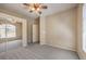 Neutral bedroom with carpet, ceiling fan and sliding closet doors at 8737 Red Brook Dr # 204, Las Vegas, NV 89128