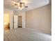 Spacious bedroom featuring neutral walls, ceiling fan and carpeting at 8737 Red Brook Dr # 204, Las Vegas, NV 89128